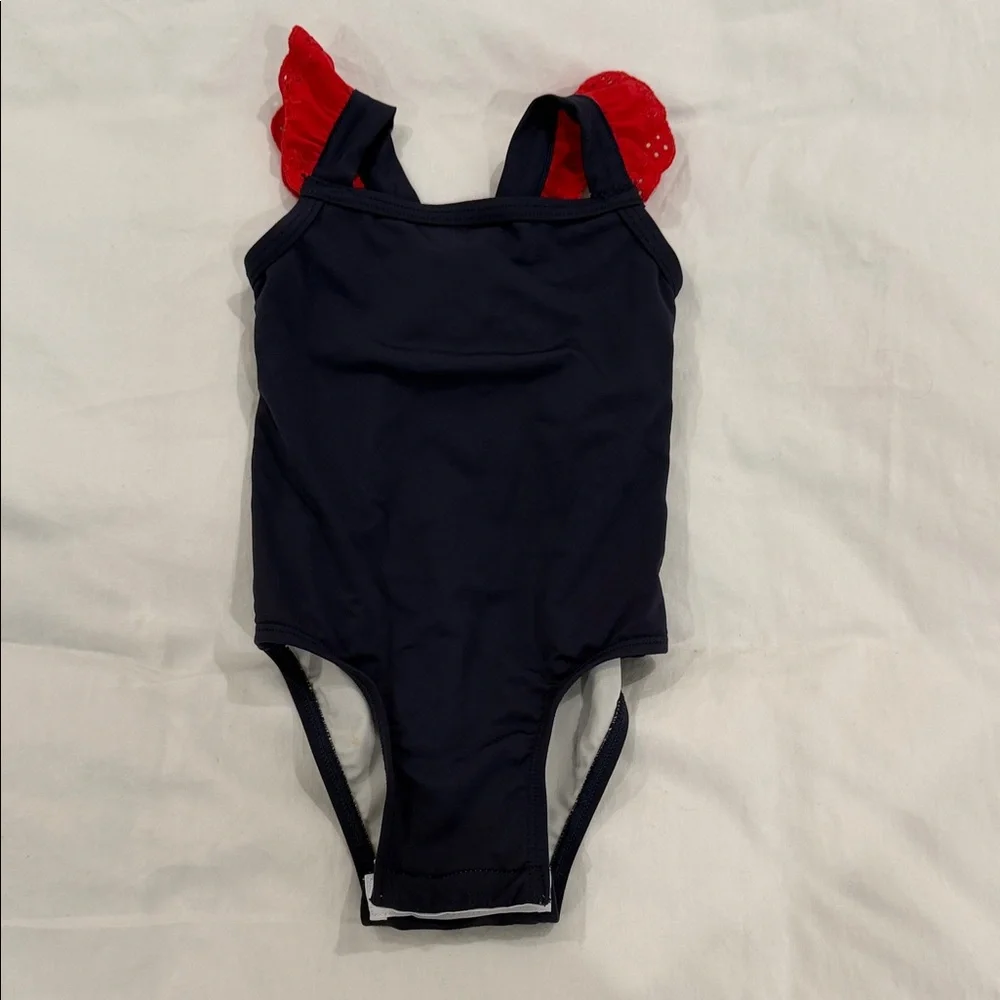 The Beaufort Bonnet Company Navy One-Piece Swimsuit with Red Ruffle Straps